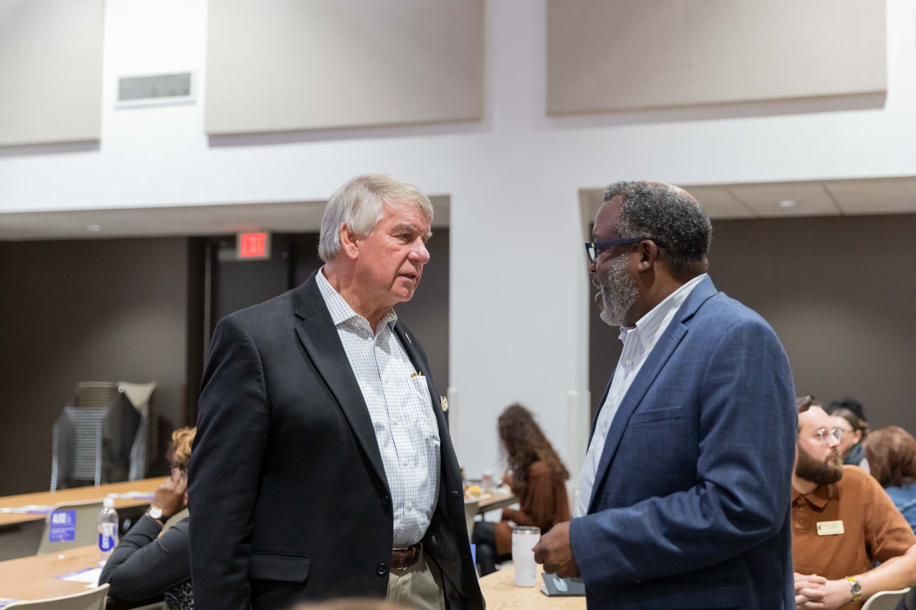 Attendees are mingling at the Summit.